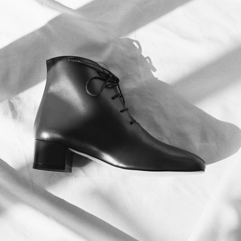 Black aupres lace up booties. Made in Portugal. Leather